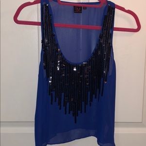 Blue sequin tank top.